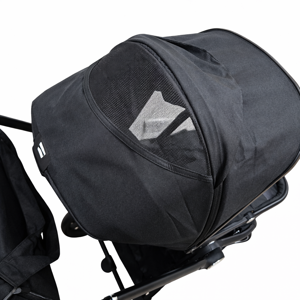 Black stroller cover on a white background