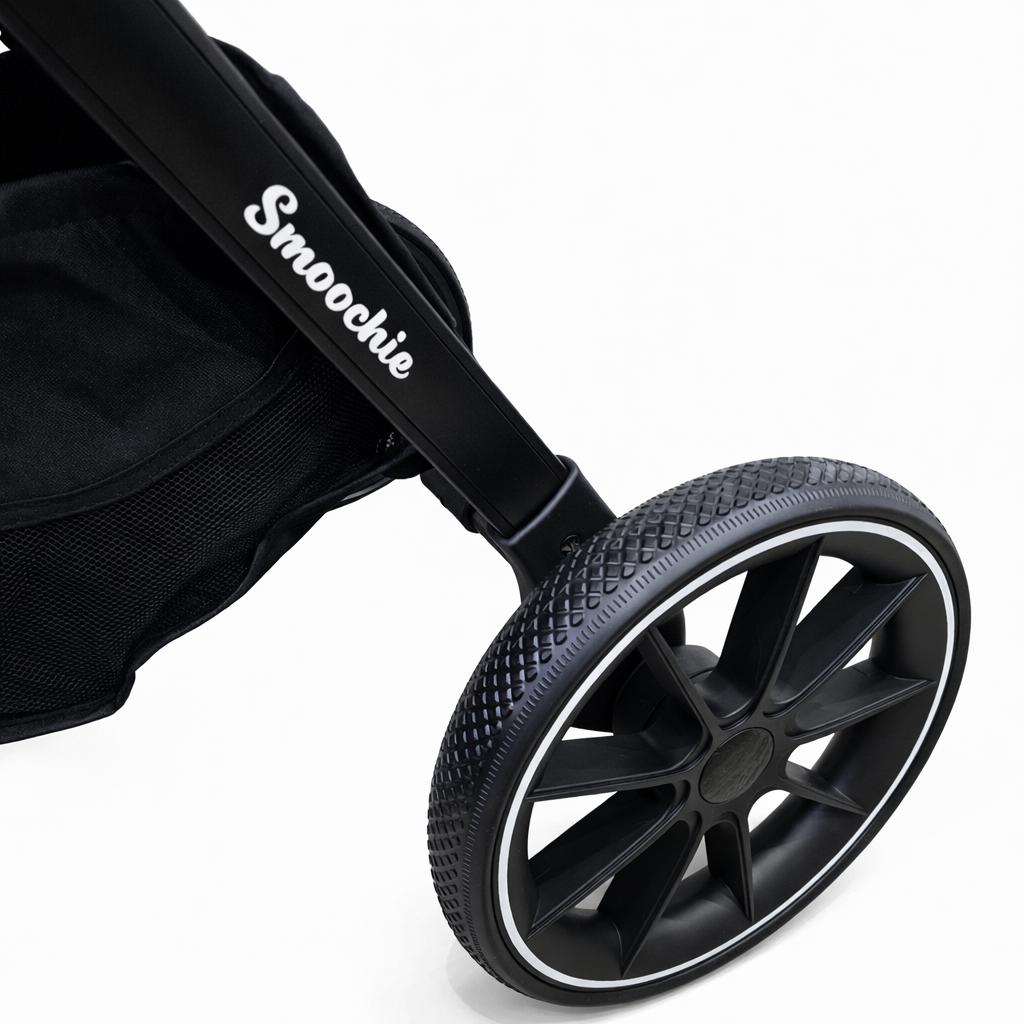 Close-up of a black rear stroller wheel with 'Smoochie' brand.