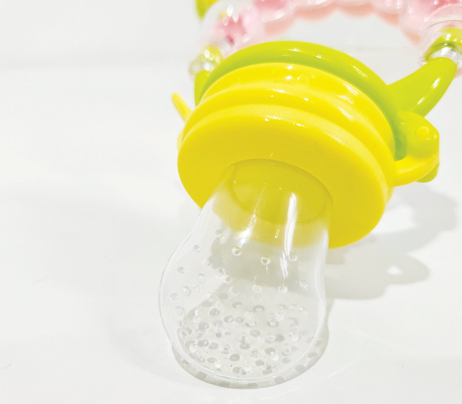 Personalised baby fruit dummy with built-in rattle, customizable with a name. Perfect for soothing and teething, this dummy combines fun and practicality. Ideal for introducing fruits safely while keeping babies entertained with the rattle sound