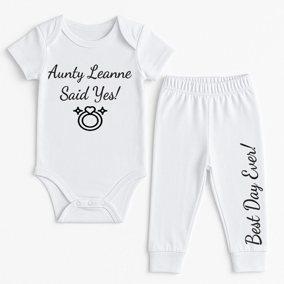 Baby outfit with the text "Aunty Leanne Said Yes!" and a heart-shaped engagement ring icon, with matching trousers that say "Best Day Ever!"