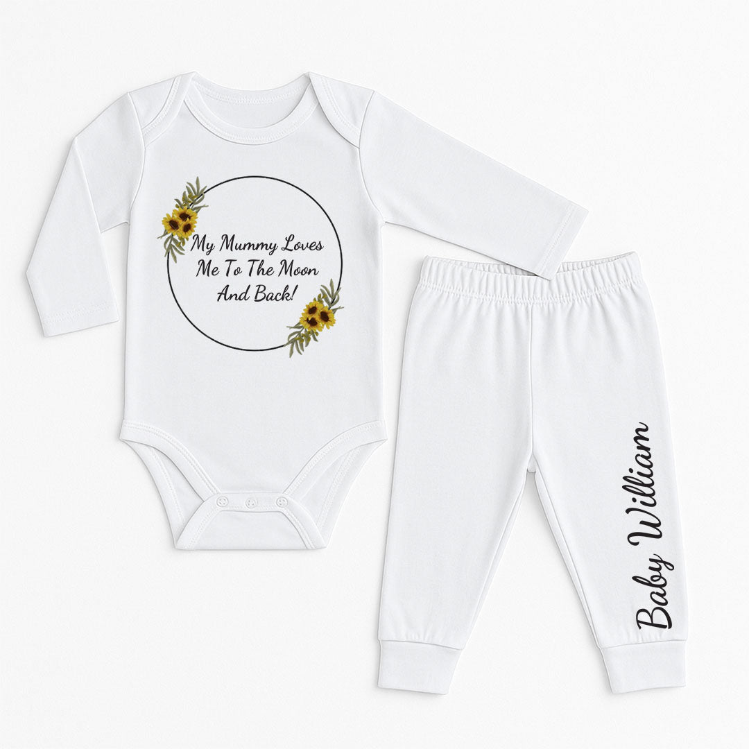White baby vest and pants set with a sunflower-themed wreath design around the message "My Mummy Loves Me To The Moon And Back!" and name "Baby William" on the pants.