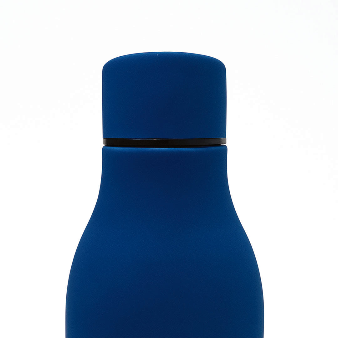 Blue bottle with a white background