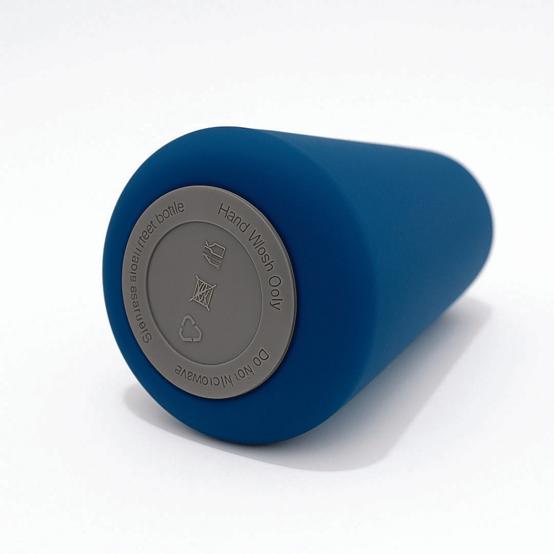 Blue bottle with gray label on a white background