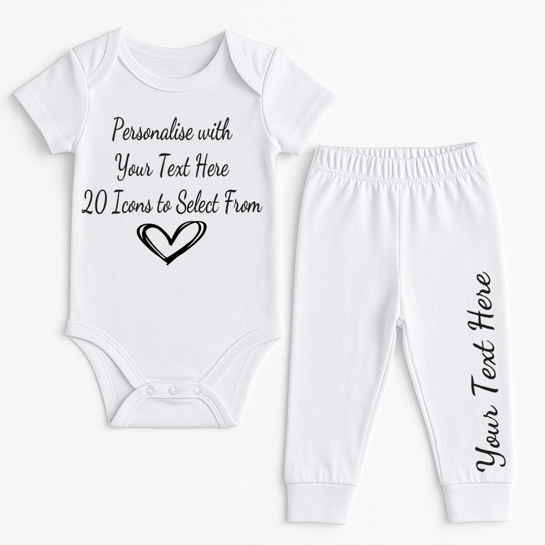 White baby bodysuit and pants set featuring customizable text and a heart icon. Personalised baby clothes with 20 icon options, perfect for baby showers or gifts.