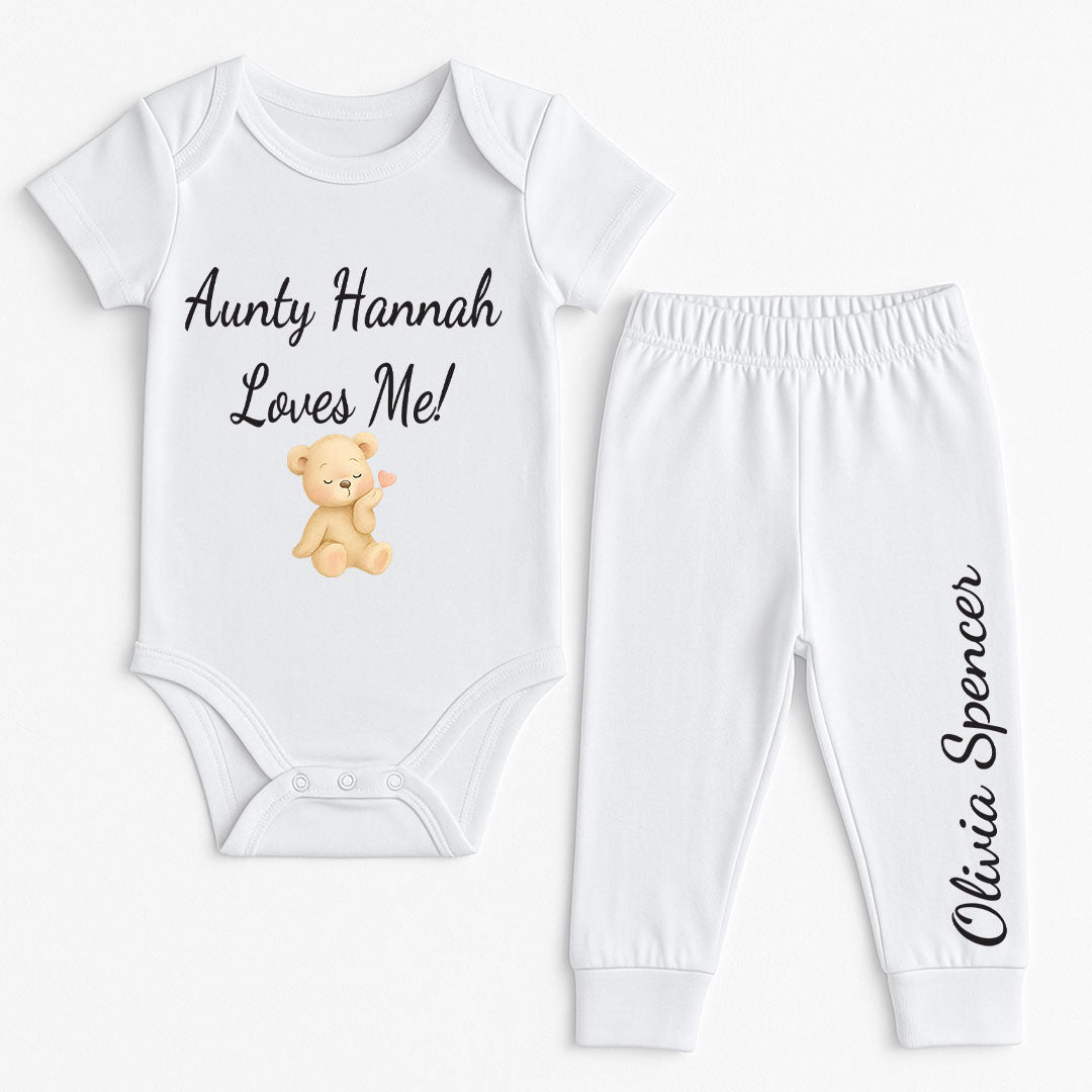 Charming two-piece baby outfit with a teddy bear graphic and personalized text options. Includes a white bodysuit with short sleeves and coordinating pants with the phrase 'Buy As Set Or Separate'. Perfect for a personalized baby wardrobe