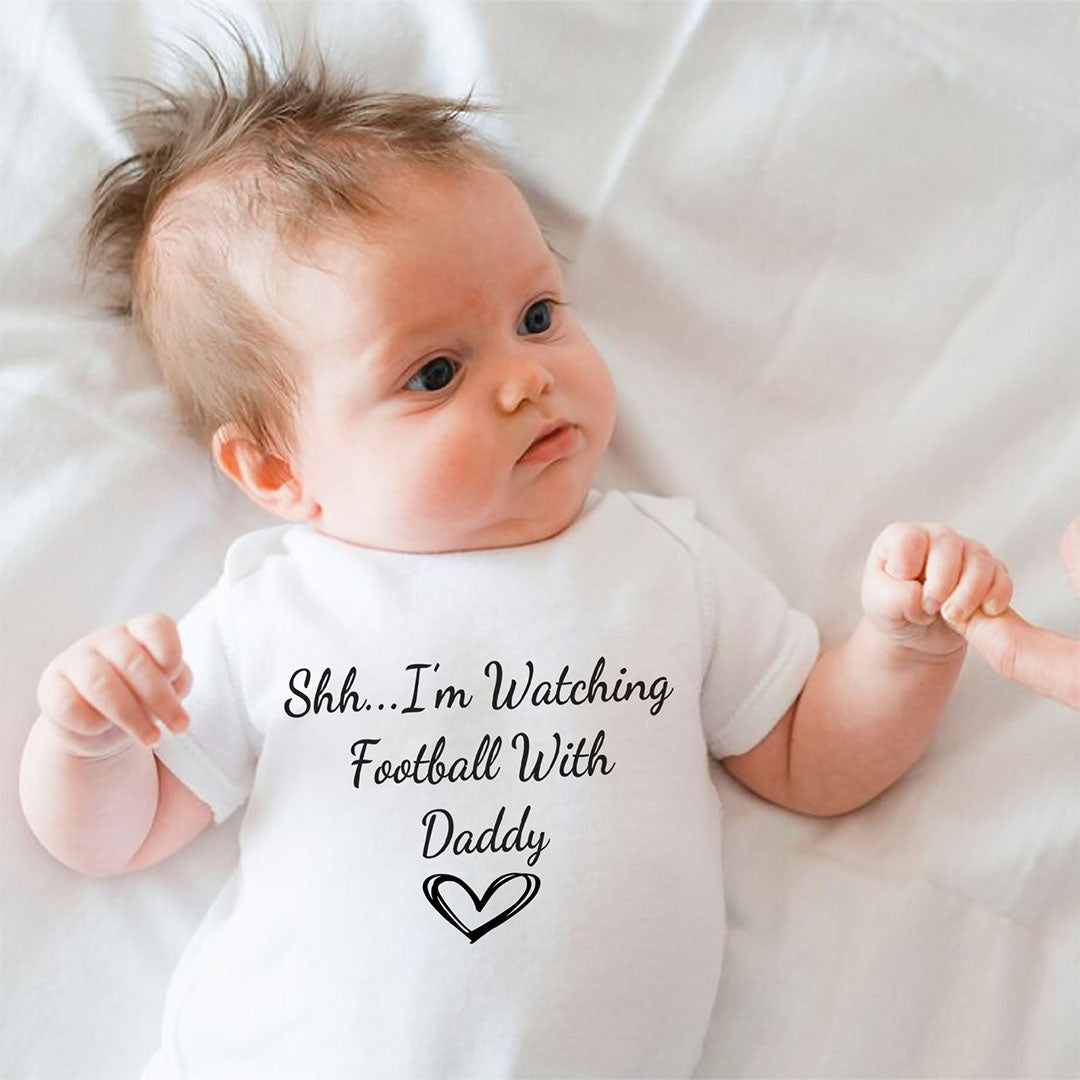 Commemorative baby onesie in pure white with touching quote "Handpicked From Heaven By My Grandad Samuel", printed in elegant black font. Thoughtful newborn gift honoring family memories.