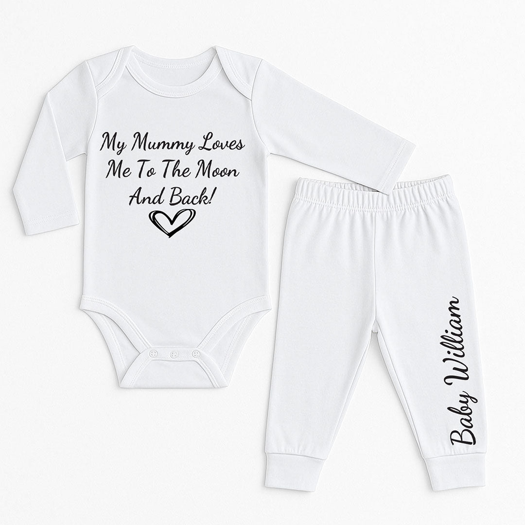 White baby romper and pants set featuring the phrase "My Mummy Loves Me To The Moon And Back!" with a heart graphic and personalized with the name "Baby William" in elegant script. Perfect custom baby gift for newborn boys or girls.