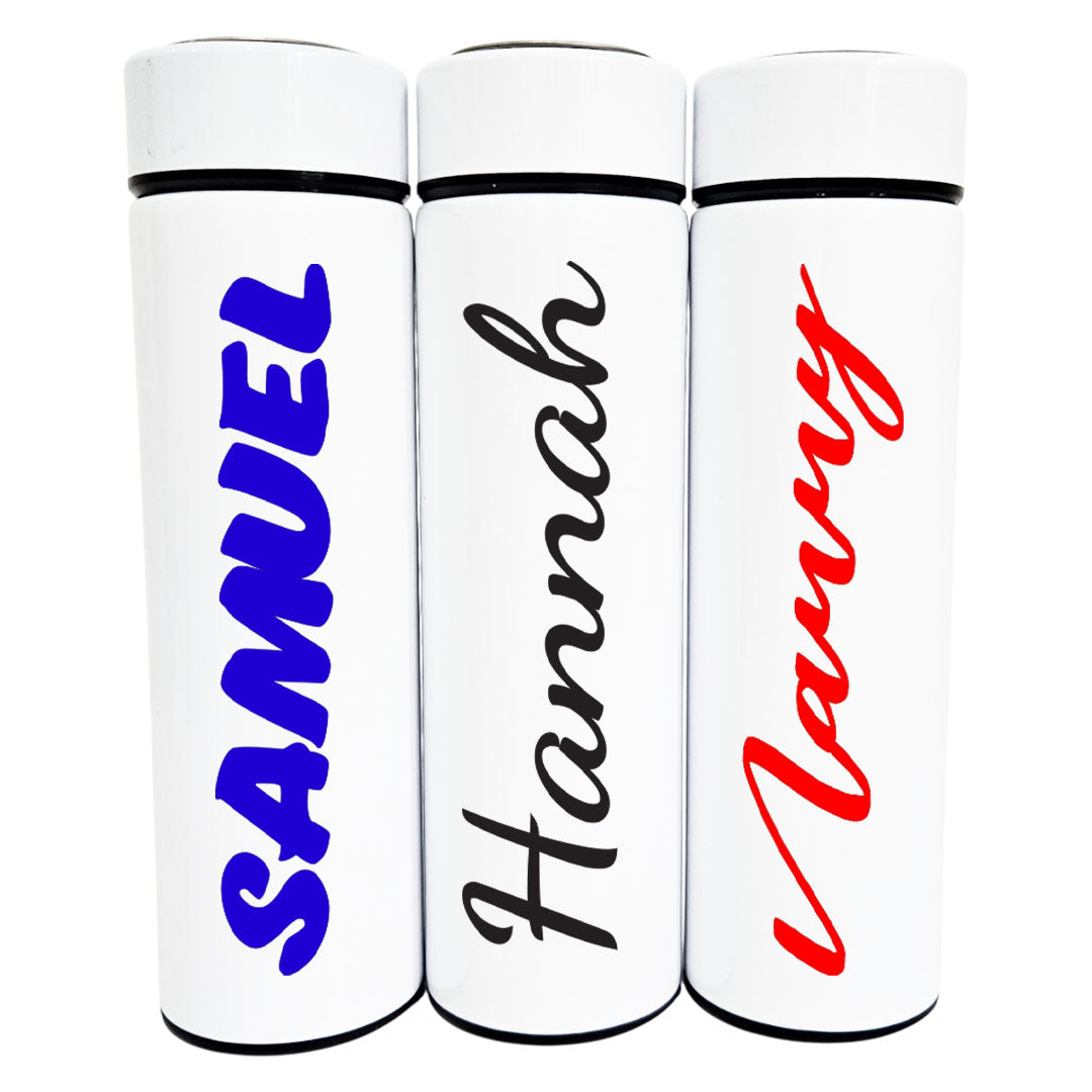 Three white tumblers with personalized names in blue, black, and red text on a white background.