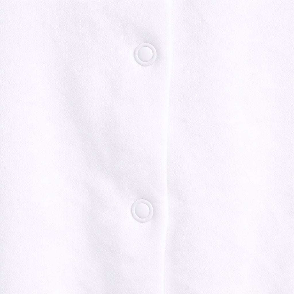 White shirt with two buttons on a white background