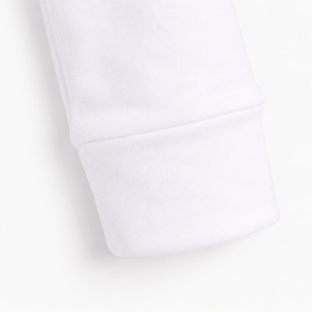 Close-up of a white pillow on a light gray background