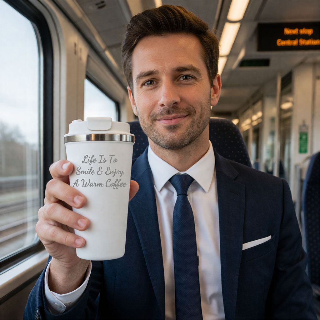 Man holding white personalised travel mug on train custom coffee cup for commuting and travel
