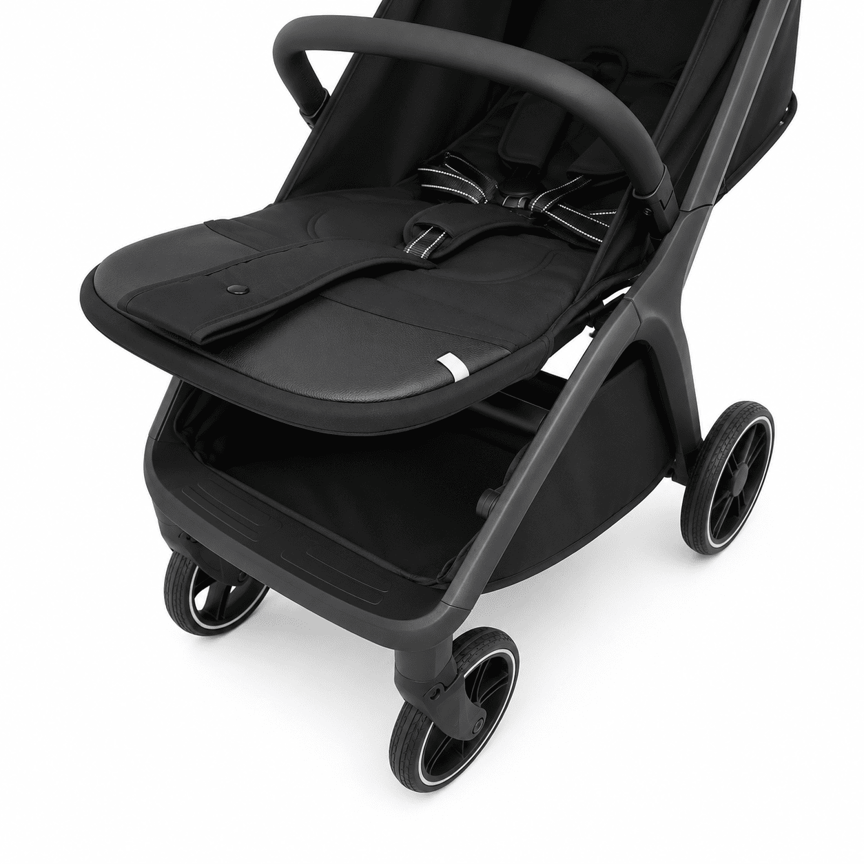 A close-up studio shot of a black stroller seat liner and matching footmuff on a dark gray stroller frame, shown against a plain white background.