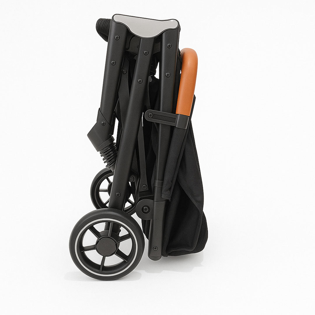Premium black stroller with adjustable canopy and leather handlebars – luxury stroller for infants and toddlers.